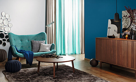Wohnzimmer in der Trendfarbe "Rivera"